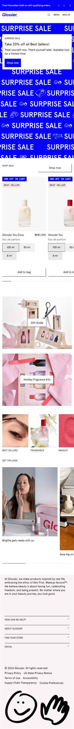 Glossier homepage on a phone